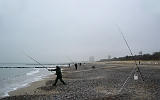 Angler am Strand von Warnemünde : Strand, Hotel Neptun